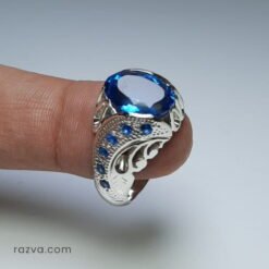 Bague artisanale en argent 925 ornée de topaze bleue et saphirs