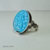 Bijou artisanal en argent avec turquoise bleue et gravure de la souveraineté divine